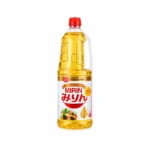 Mirin Japanese cooking seasoning bottle with a red cap and golden liquid.
